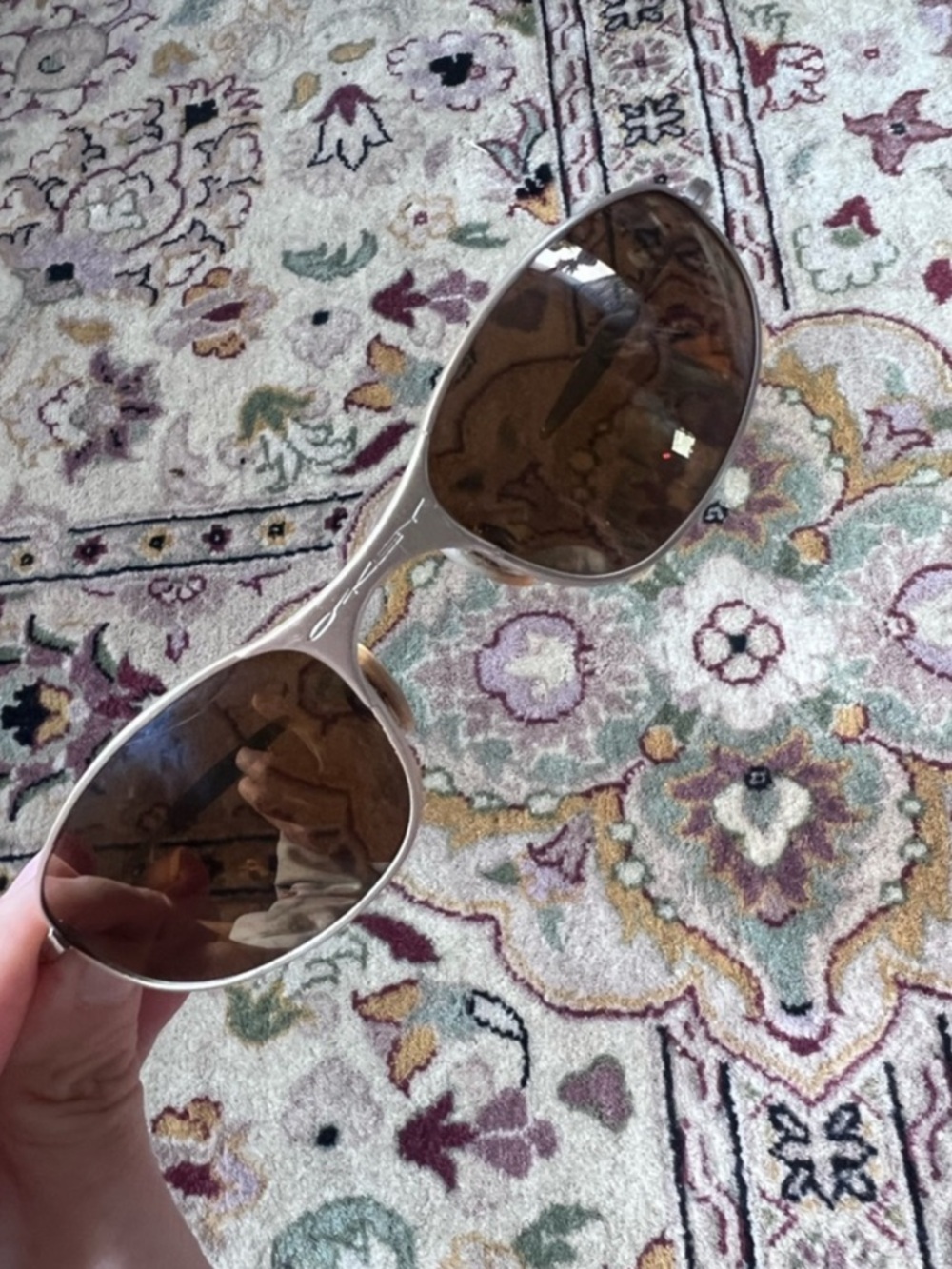 Oakley Women's Silver Frame Sunglasses with Brown Lenses